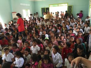 250 plus children were packed in this small church patiently waiting for the goodies